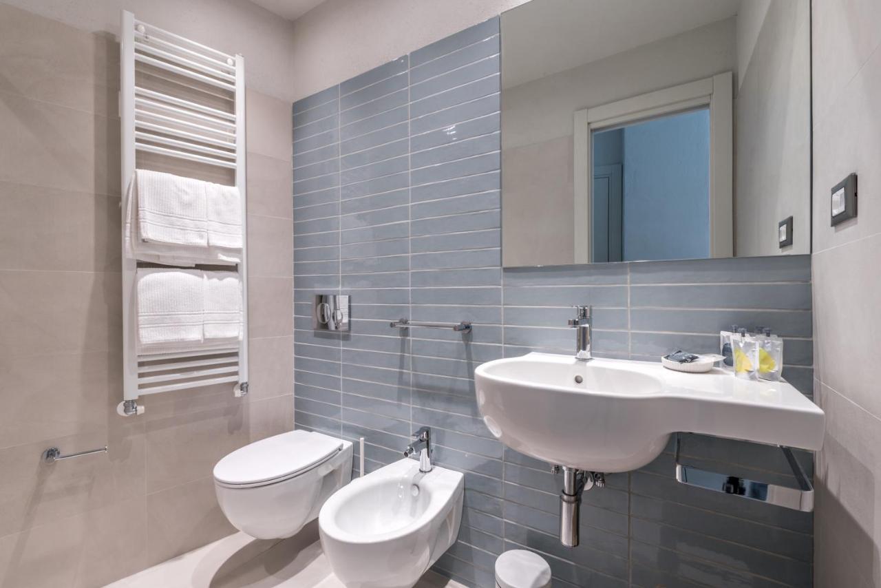 Amanarola Hotel Bagian luar foto